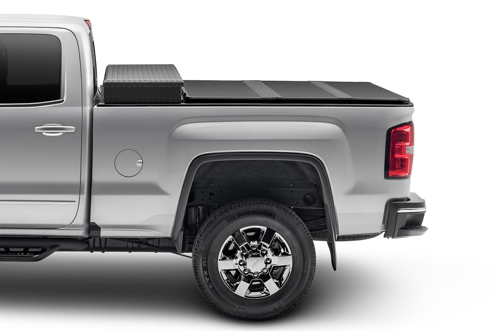 Solid Fold 2.0 Tool Box Tonneau Cover-Black Textured Paint-For Use w/Existing Tool Box-Tool Box Not Included-2009-2018 (2019-2024 Classic) Ram 1500/2010-2024 2500/3500 6ft. 4in. Bed without RamBox